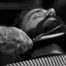 Barber Trimming Client Beard