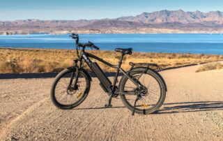 Electric Bike Standing on Dirt Road Close to Lake