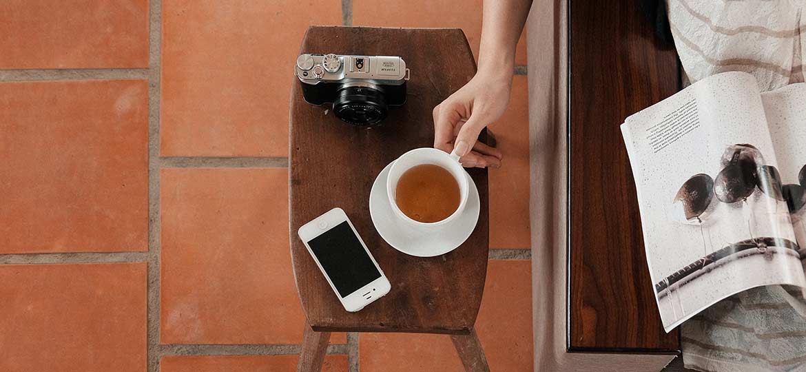 Person Drinking Tea and Reading