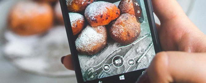 Person Taking Photo on Smartphone