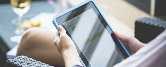 Person Holding Tablet