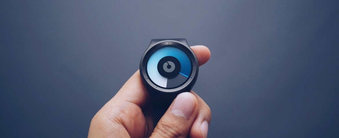 Person Holding Smartwatch 1