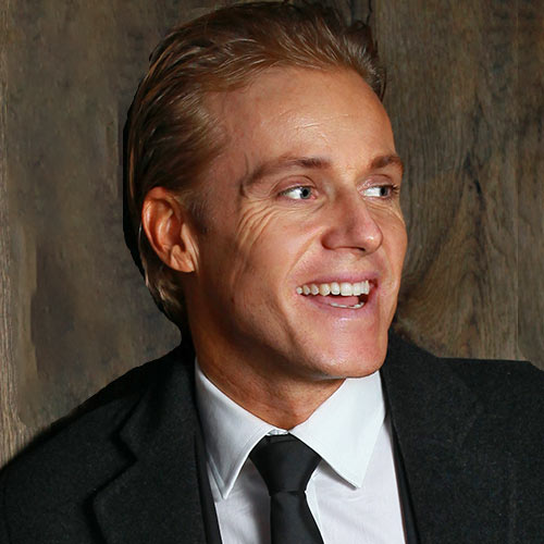 Man Wearing Suit Smiling