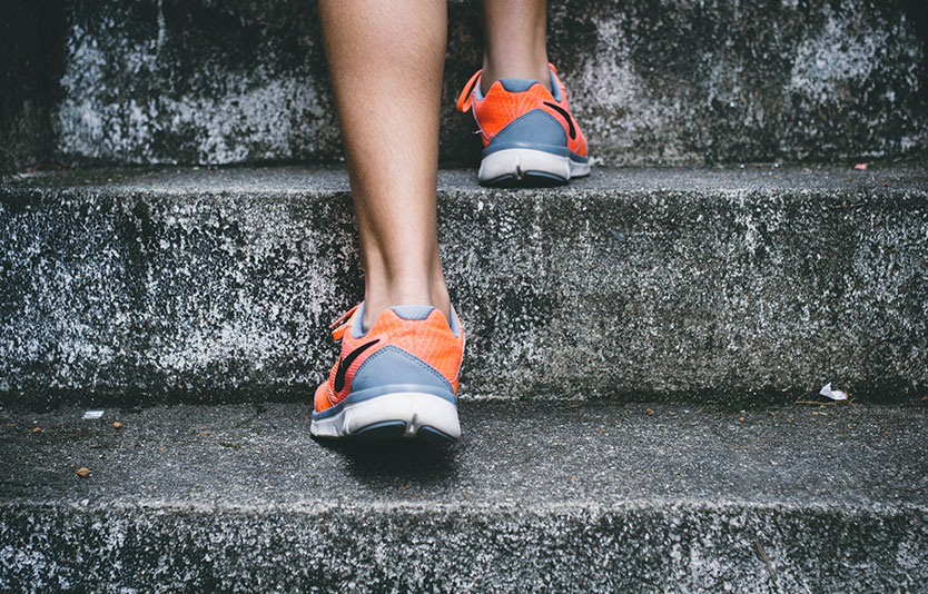 Person Wearing Running Shoes