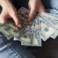 Money Fanned Out in Persons Hands