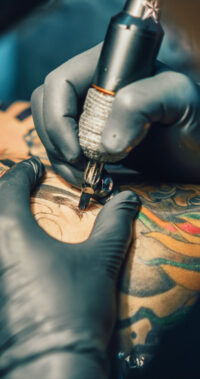 Person Getting a Tattoo Person Getting a Tattoo