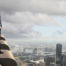 Person Standing on Top of Building